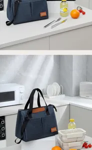 Vista dettagliata della borsa termica blu scuro in cucina moderna con accessori e tracolla.