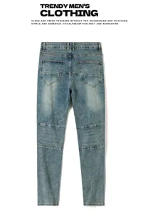 Men's slim fit biker jeans with vintage washed light blue color and stylish knee panels.