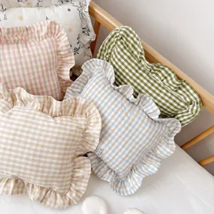 Nordic style ramie plaid ruffled baby soothing pillow and square cushion detail.