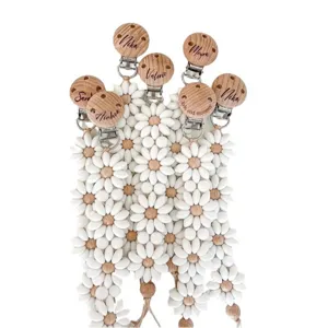 Personalized wooden silicone daisy pacifier clip custom engraved baby shower gift main view.