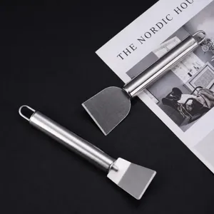 Outil de grattage de nettoyage de cuisine en acier inoxydable pour cuisinière et poêles.