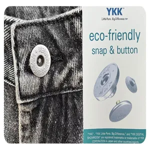 Dark wash denim fabric featuring durable metal snap button and eco-friendly YKK fastener card.