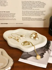Minimalist white cloud jewelry display tray for rings earrings necklaces desktop decor details.