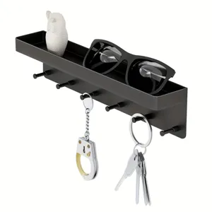 Wandgemonteerde metalen opbergplank met haken, ideaal voor sleutels, brillen en kleine voorwerpen.