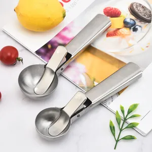 Stainless steel ice cream scoop with trigger, durable dessert spoon for fruit and gelato.