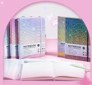 Detail of A5 glittery hardcover notebooks showing starry PU covers and lay-flat open pages