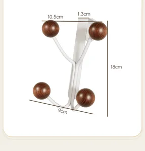 Detail view of over the door hook, showing precise dimensions of wooden balls and metal frame.