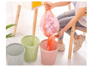 Detail shot showing the hollow plastic trash can in use, demonstrating easy bag pulling.