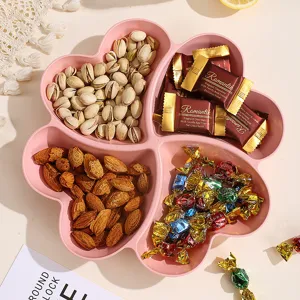Pink four leaf clover snack tray, multi grid fruit plate for living room dried food storage.