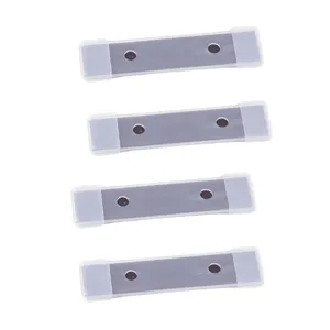 Close-up detail of magnetic descaling cleaning rods with protective plastic caps on white.