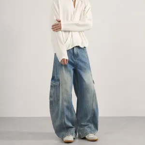 Retro washed baggy cargo jeans for men and women, loose fit casual denim trousers trend.