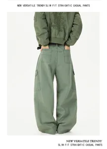 Back view detail of casual loose fit cargo pants with multiple pockets and trendy design.