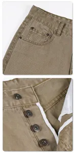 Vintage khaki casual pants detail shot featuring metal buttons and classic pocket design.