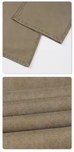 Detailed close-up view of vintage casual pants fabric texture and neat hem stitching.