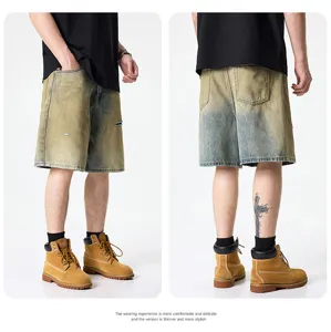 Short en denim jaune délavé vintage pour homme, coupe droite ample et déchirée pour l'été