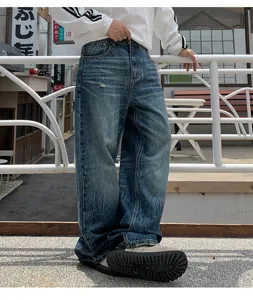 Vintage wash loose straight leg denim jeans for men, casual wide leg streetwear style pants.
