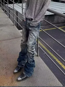Men streetwear stacked flare jeans, blue distressed wave pleated denim with button fly detail.