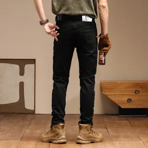 Jeans negros slim retro para hombre, pantalones largos estilo moto casual con bolsillos.