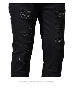 Men's black distressed rhinestone slim fit straight casual denim jeans with trendy patches.