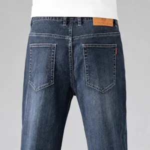 Jean droit extensible bleu foncé pour homme, pantalon décontracté de printemps avec poches arrière.