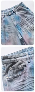 Close-up details of casual light blue gradient tie-dye denim shorts showing pocket and waist.