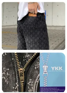 Men's streetwear washed distressed black denim shorts with cross print and YKK zipper.