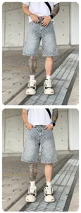 Detailed view of American high street washed printed distressed denim shorts for men streetwear.