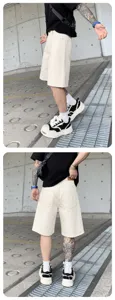 Men's retro washed denim shorts casual streetwear fashion detail view showing fit and texture