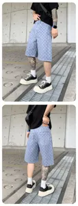 Men's washed printed denim shorts, casual loose fit five-point streetwear trousers.