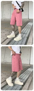 Men's washed pink denim shorts high street casual streetwear printed summer bottoms.