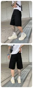 Men's black washed denim shorts, high street style distressed casual summer trousers for men.