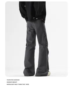 Detail view of American cleanfit cargo flare denim trousers, multi-pocket dark grey jeans.