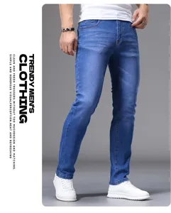 Men's slim fit denim jeans detail showing classic blue wash and comfortable fabric texture.
