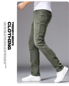 Detailed side view of men's slim fit green denim jeans, showing clean stitching and cut.