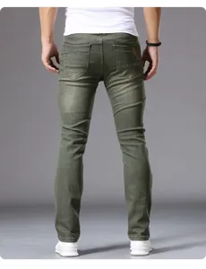 Men's slim fit casual denim jeans in stylish military green, perfect for daily wear.
