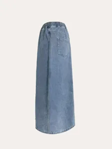 Close up detail view of the womens blue denim long maxi skirt with back pocket and elastic waist.