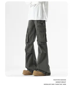 Close-up detail view of dark grey American cleanfit multi-pocket cargo flared denim pants.