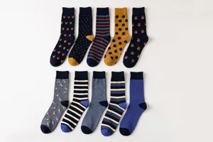 Men's mid-calf cotton socks assorted patterns set, breathable elastic casual socks detail.