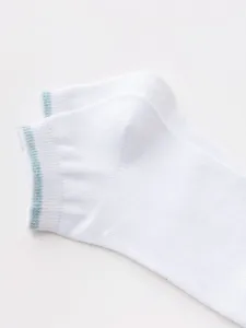 White cotton low-cut ankle socks for women with metallic blue stripe details at ribbed cuff.