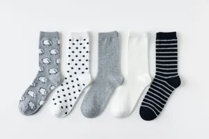 Casual cotton crew socks set featuring cute sheep, polka dots, solid colors and classic stripes.