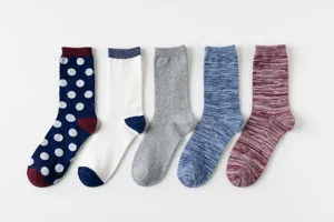Comfortable cotton mid-tube socks for adults, assorted colors and patterns for daily wear.
