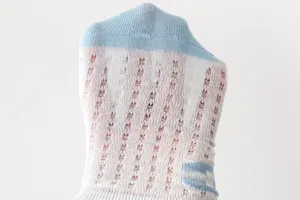 Detailed view of breathable kids mesh ice silk socks, showing elastic fabric and fine weave.