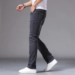 Men's classic slim fit tapered jeans stretch denim casual trousers for daily wear