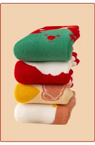 Detailed view of thick winter Christmas cotton socks, cozy plush fleece lined terry knitwear.
