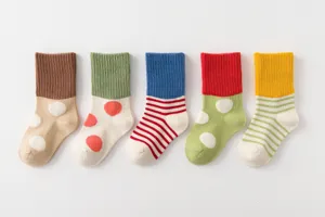 Colorful cotton kids socks with cute polka dot and stripe patterns, warm daily wear for kids.