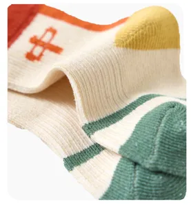 Comfortable cotton kids mid-tube socks featuring cute color block designs and soft breathable knit