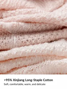Soft breathable cotton kids socks fabric close-up view showing delicate knit texture detail.