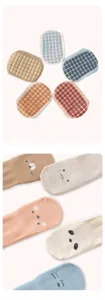 Details of anti-slip toddler floor socks with cute animal patterns and rubber grip soles.