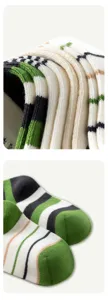 Closeup detail of kids striped mid-tube socks showing fine knit texture and preppy style.