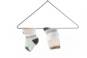 Breathable infant mesh socks detail showcasing soft cotton fabric and stylish color blocking.